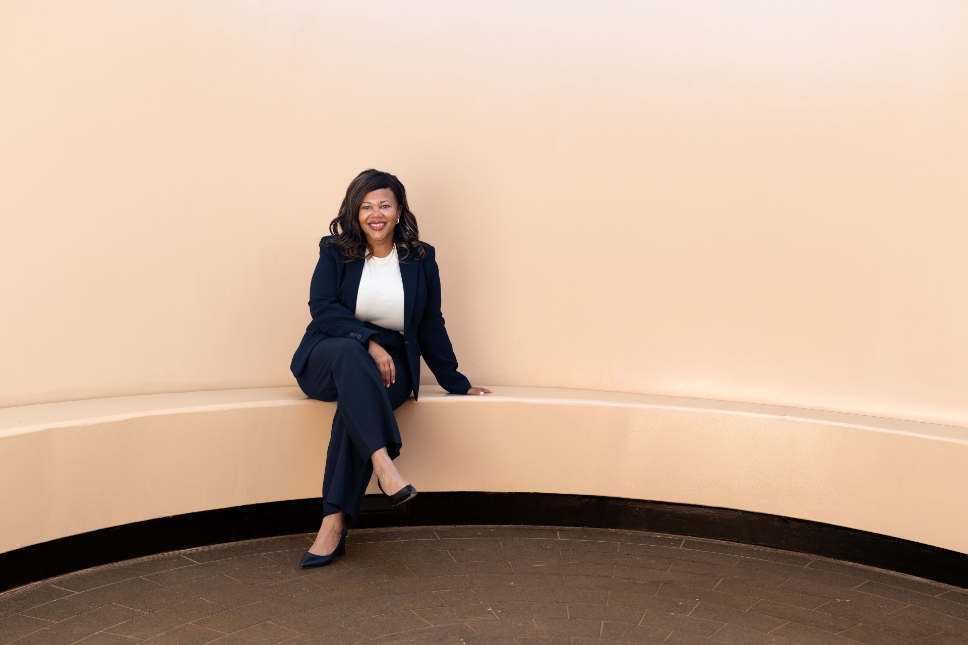 Olivia White seated